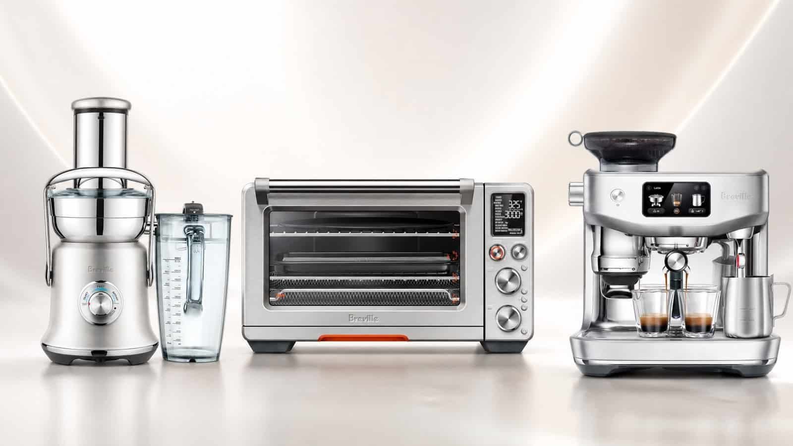 Multiple Breville kitchen appliances displayed on a modern kitchen counter