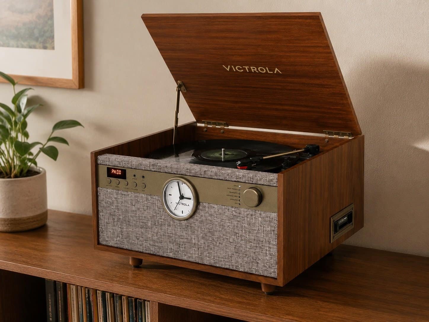 Victrola Century Signature+ 6-in-1 wood record player on shelf with vinyl collection