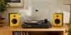 Victrola review – Third Man Records turntable and Tempo speakers in yellow and black on wooden shelf
