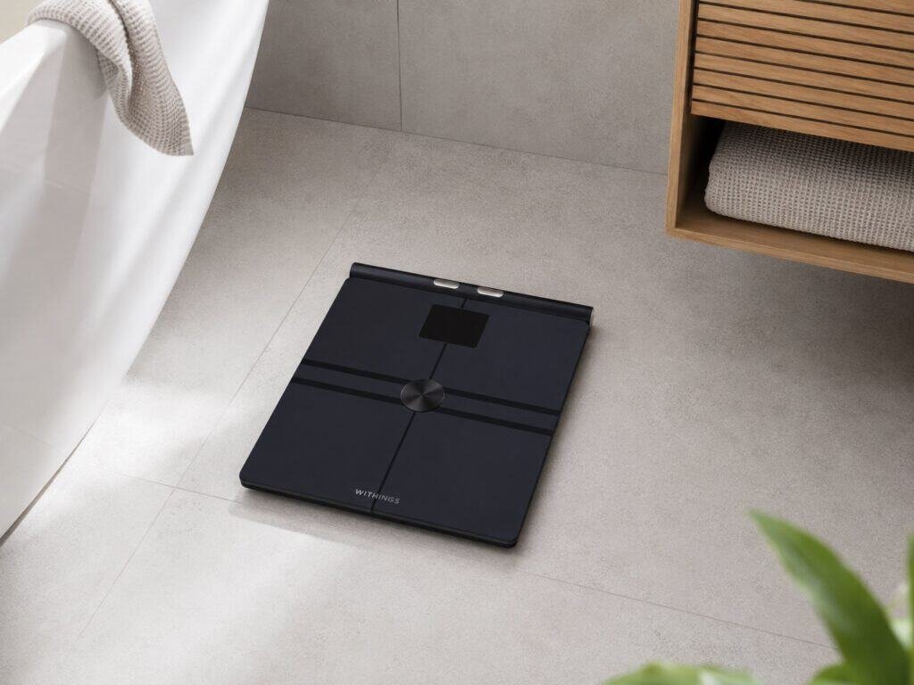 Withings BodyFit smart scale with retractable handle used for segmental body-composition measurements